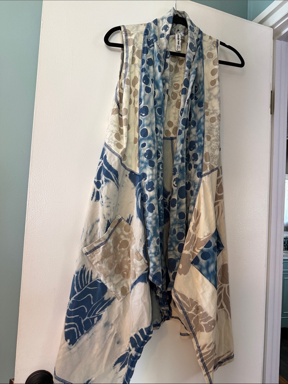 Cotton Fish Motif Cascading Vest in Crean and blue.